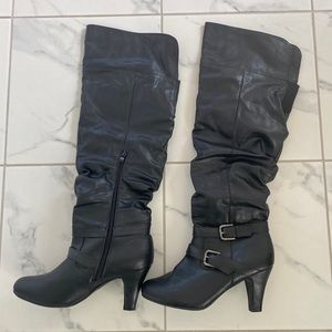 Tall black boots. Size 10. Good condition